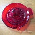 Hand made red colored glass juicer